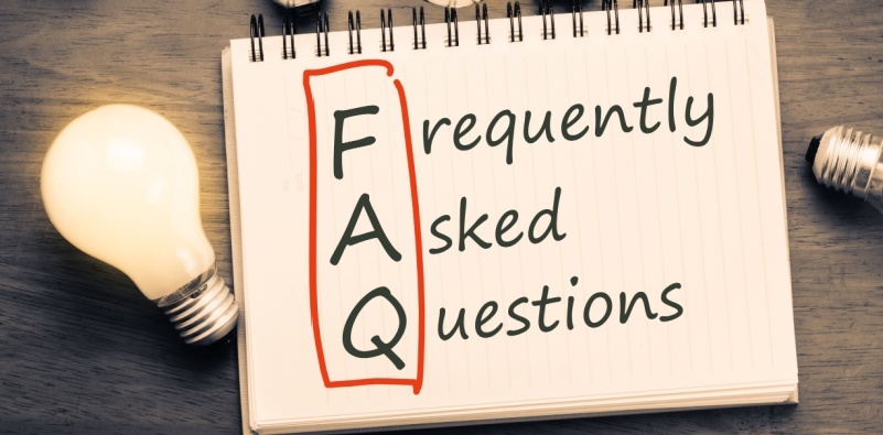 A notepad displaying FAQ (frequently asked questions) text with a lightbulb icon, symbolizing helpful eye care advice.